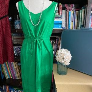 Gorgeous green dress. I love the crochet detail!